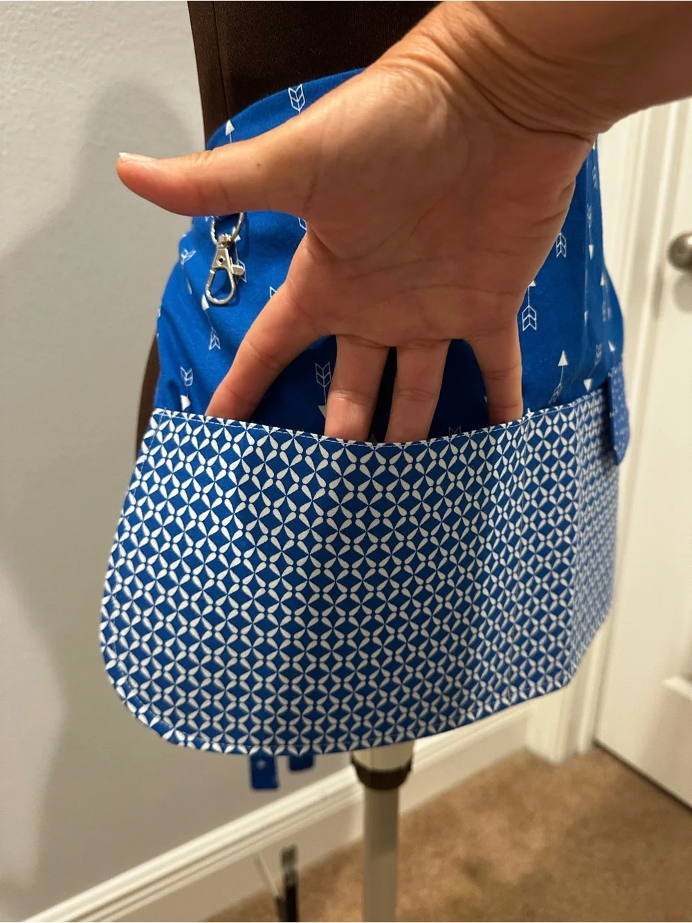 Blue Patterned Apron with Pockets across the front and a Snap Pocket